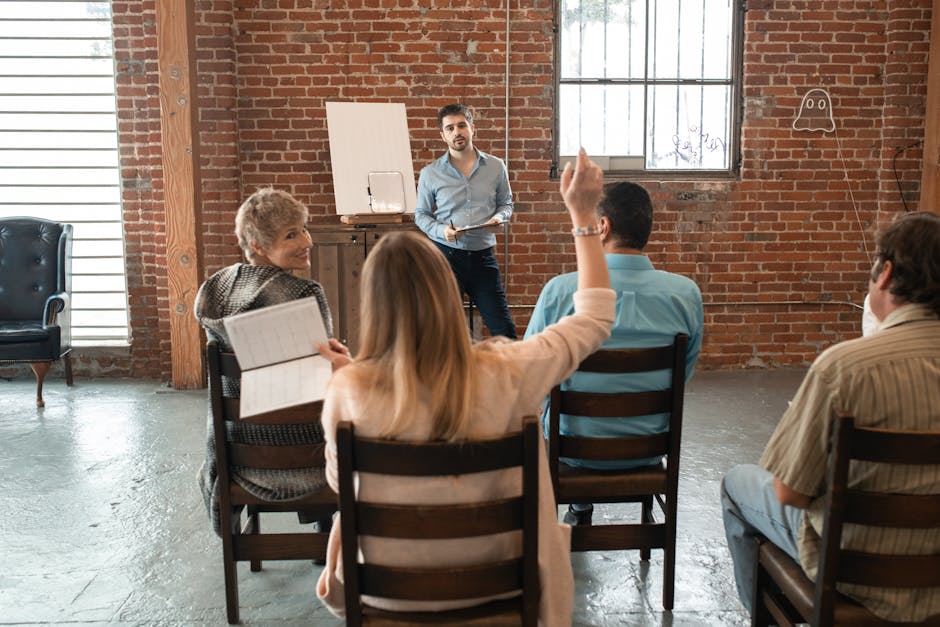 Participants collaborating around a community learning table